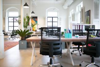 A comparison of the benefits of renting and buying an office.
